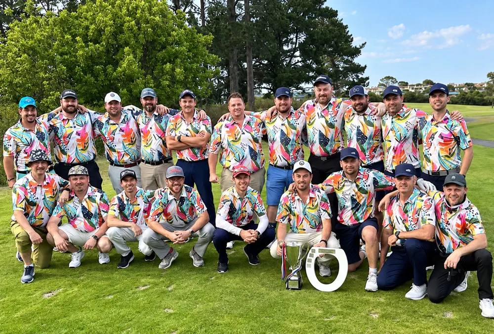 Golf team in floral shirts with a trophy
